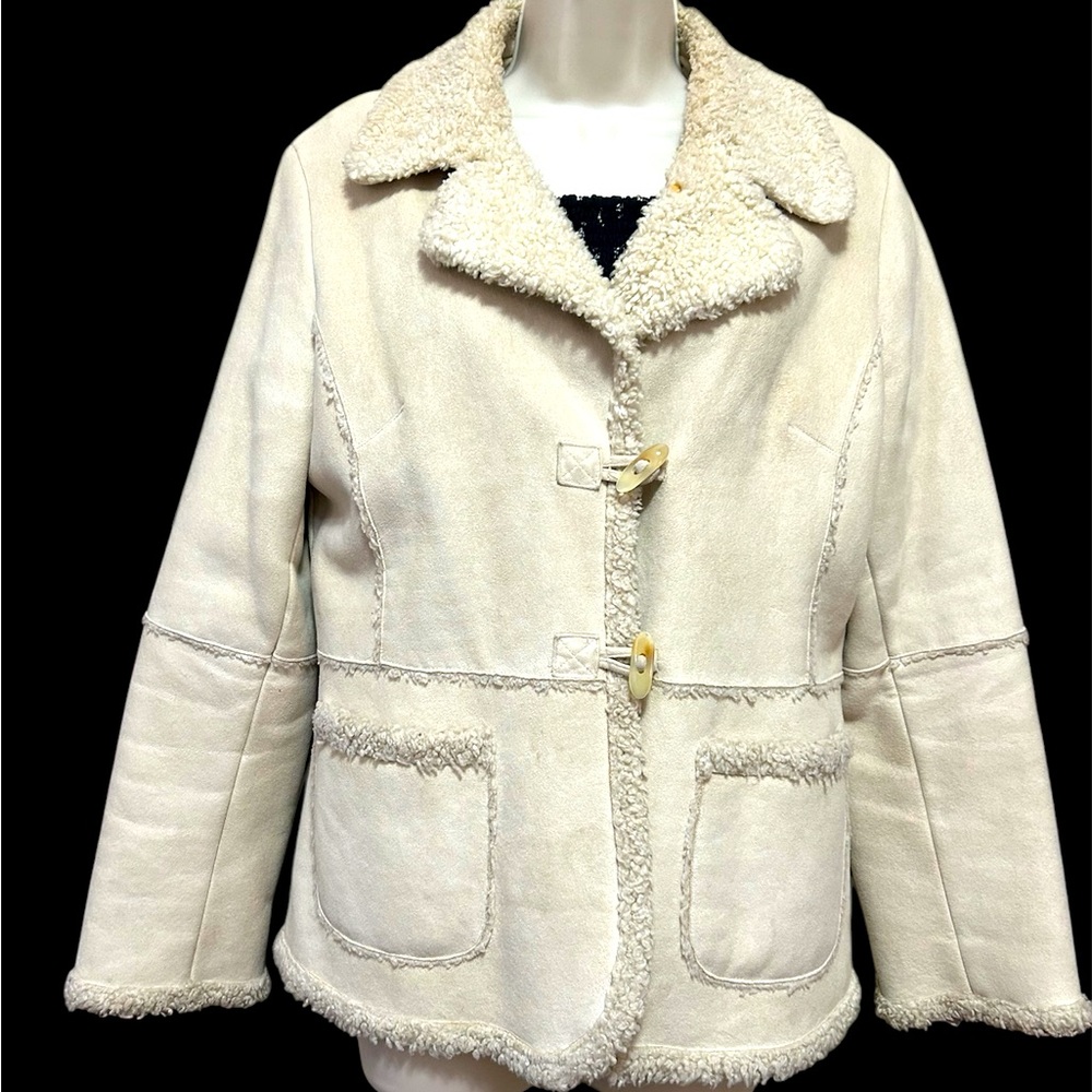 Nice and warm ivory colored ladies jacket.